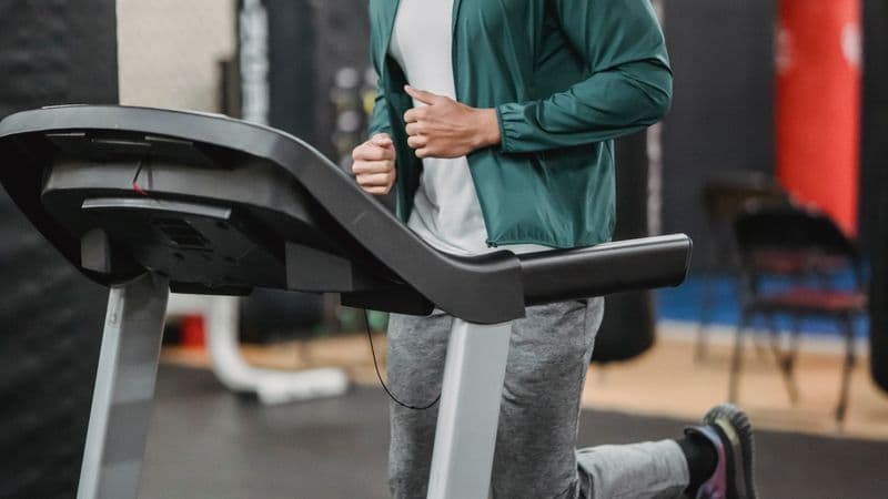 A treadmill in a home gym setting